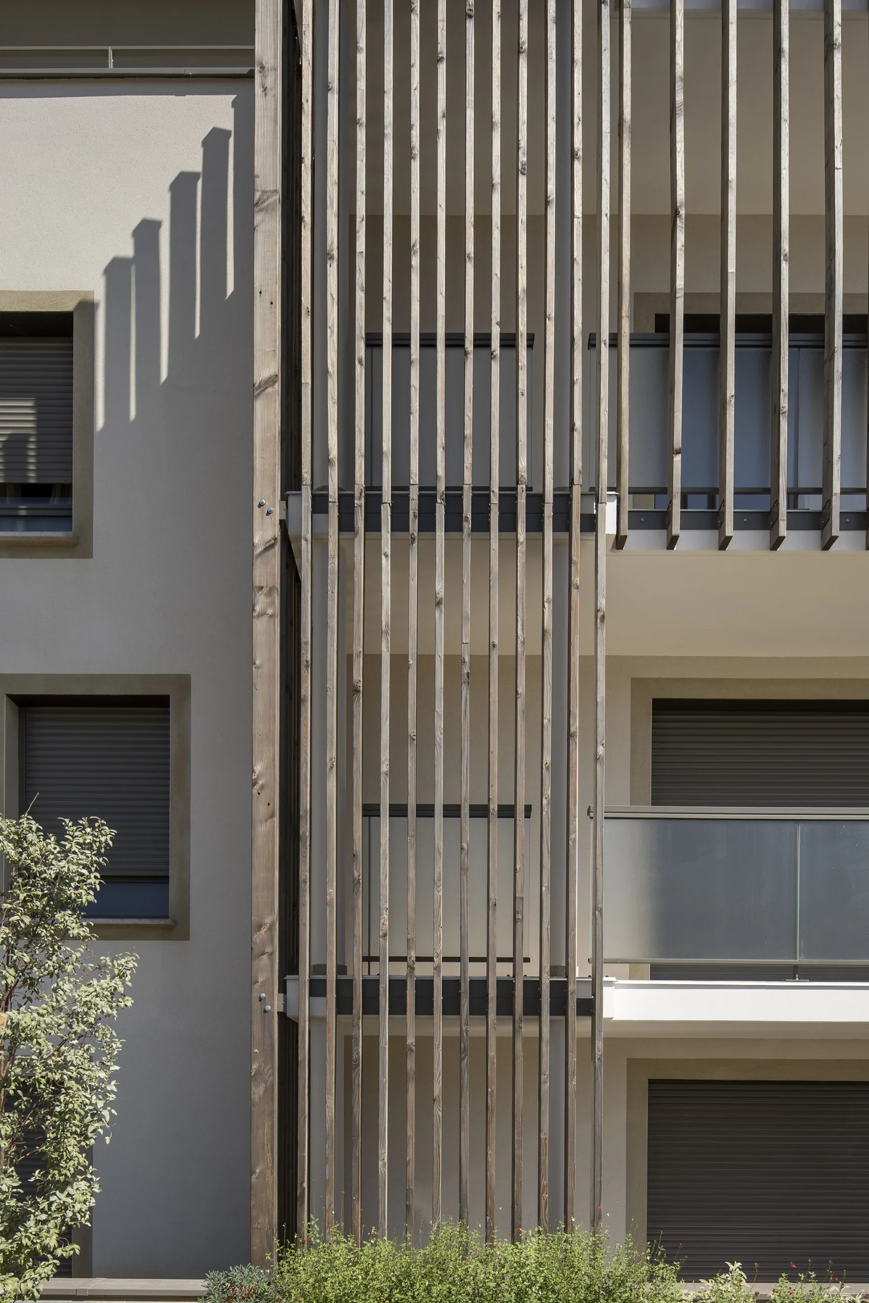 Détail des lames verticales en bois de la façade du Domaine Marquise